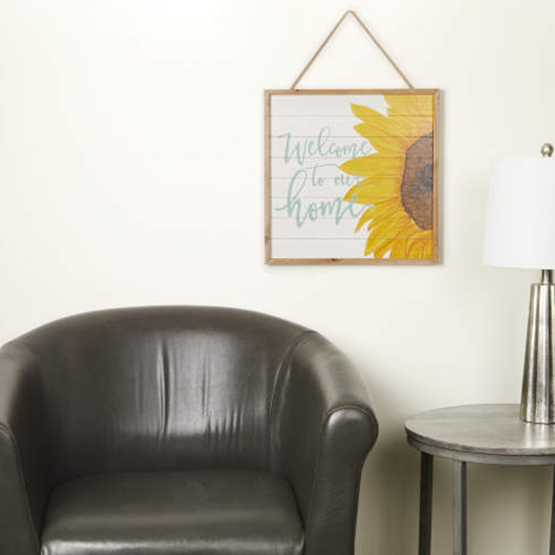 Placca da parete in legno di girasole da appendere 'Benvenuti a casa nostra'.